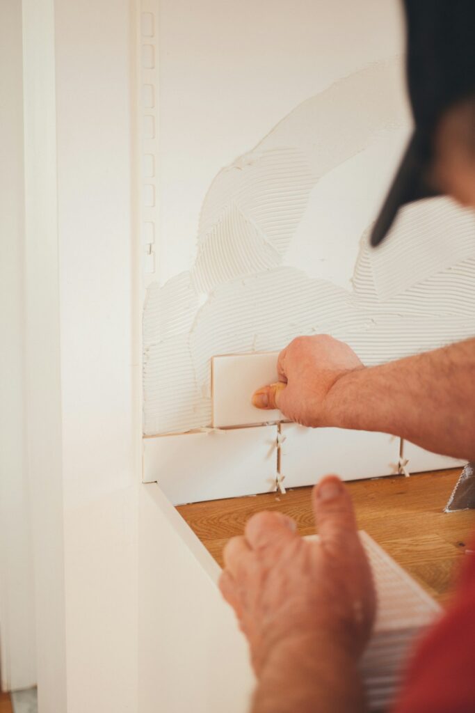 Documenting the process of tiling the kitchen backsplash.